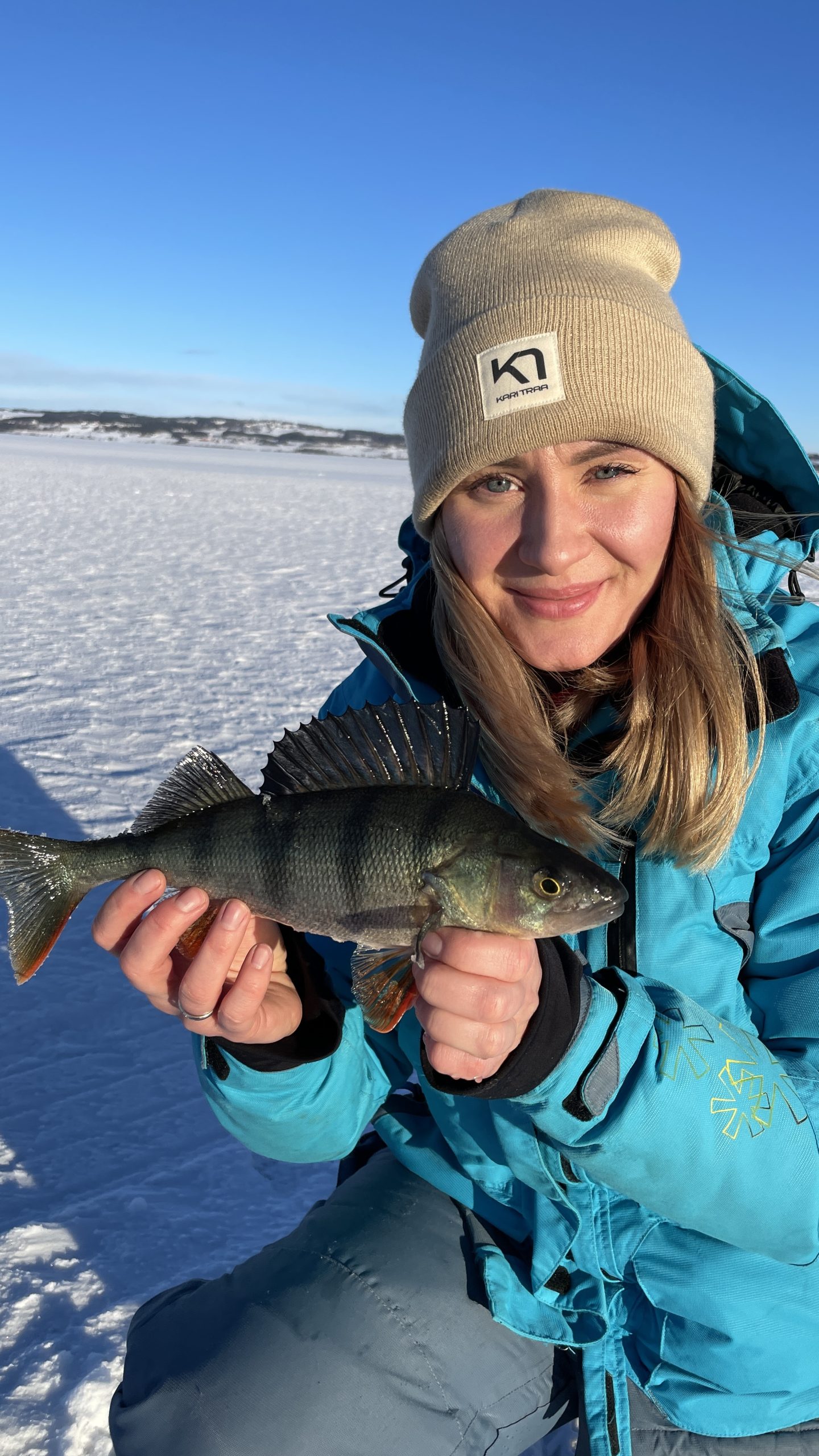 Yuliia Buhlak fishing outdoors in Norway